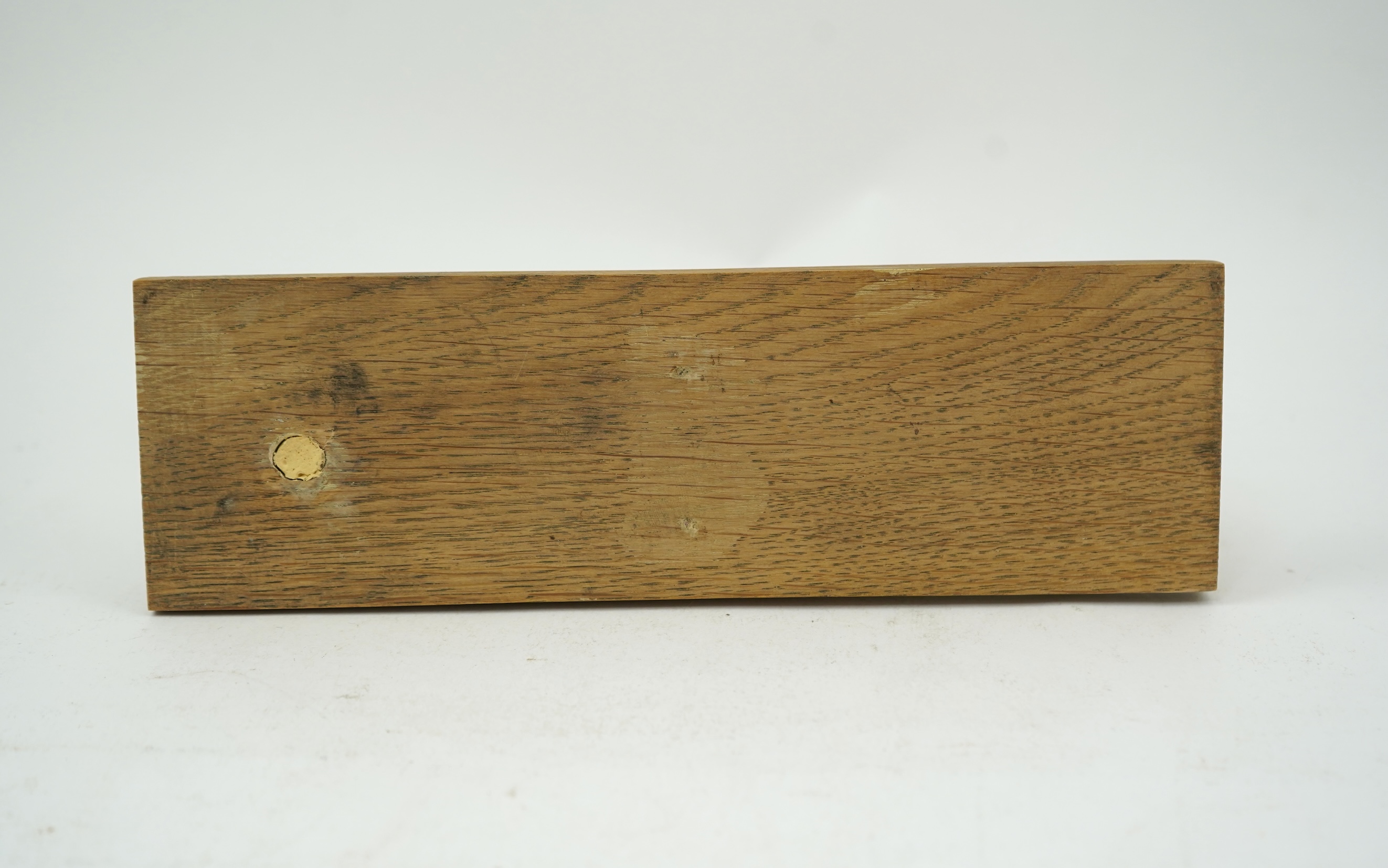 Follower of Henry Moore (1898-1986) A modernist stringed plaster sculpture raised on an oak rectangular plinth base, 25cm wide